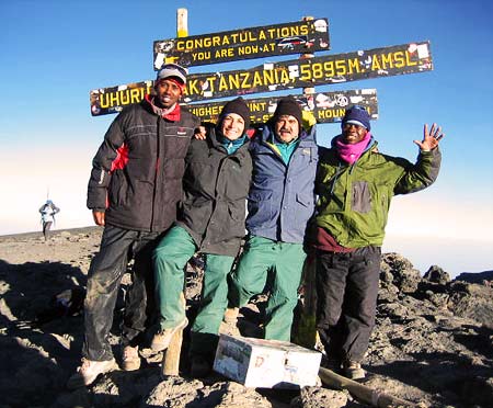 Lucinda Roenicke on the summit of Kilimanjaro, 7summits.com Expeditions